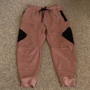 Jordan Men's Dri-FIT Air Fleece Pants in Pink/Fossil Rose (Size XL)